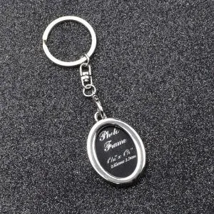 Брелок Фоторамка овальная. Цвет стальной.