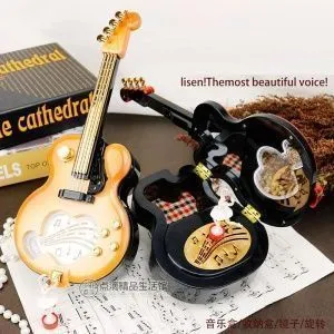 Музыкальная шкатулка заводная Гитара. Материал - АБС пластик.